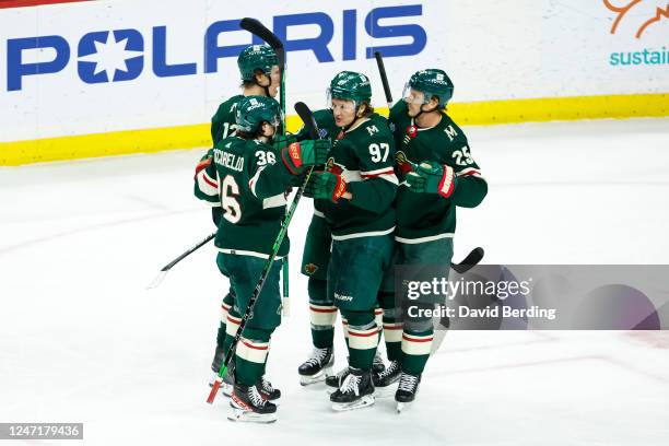 Kirill Kaprizov of the Minnesota Wild celebrates his goal against the Colorado Avalanche with teammates in the third period of the game at Xcel...