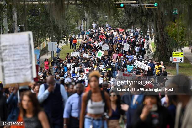 Demonstrators protest Florida Governor Ron DeSantis plan to eliminate Advanced Placement courses on African American studies in high schools as they...