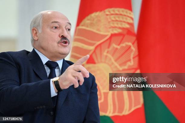 Belarus' President Alexander Lukashenko speaks as he meets with foreign media at his residence, the Independence Palace, in the capital Minsk on...