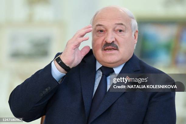 Belarus' President Alexander Lukashenko speaks as he meets with foreign media at his residence, the Independence Palace, in the capital Minsk on...