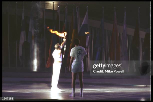 An archer lights the flame at the opening ceremony of the summer olympics in Barcelona, Spain. Mandatory Credit: Mike Powell/Allsport UK