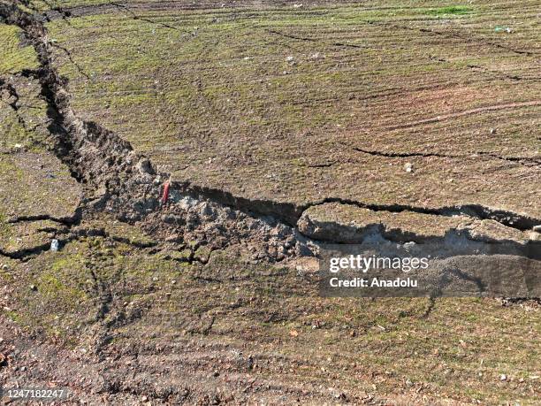 An aerial view of a barley field at the district of Islahiye in Gaziantep, Turkiye on February 16, 2023. Long and deep crevices were formed after the...