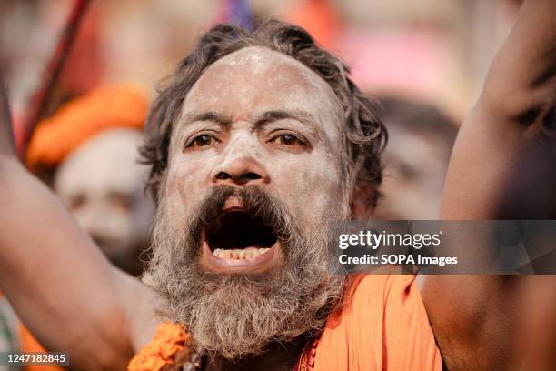 Hindu holy man or Naga sadhu, applies ash on his body at the premises of the Pashupatinath Temple ahead of the Shivaratri festival in Kathmandu....