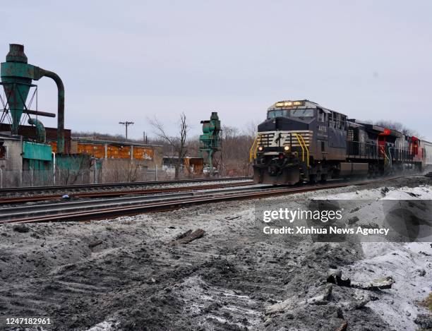 Norfolk Southern freight train runs past the site of the Feb. 3 derailment on the outskirts of the village of East Palestine, Ohio, the United...