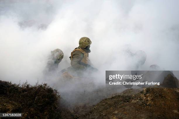 Ukrainian soldiers take part in a trench warfare training exercise on February 16, 2023 in an unspecified location in the United Kingdom. The...