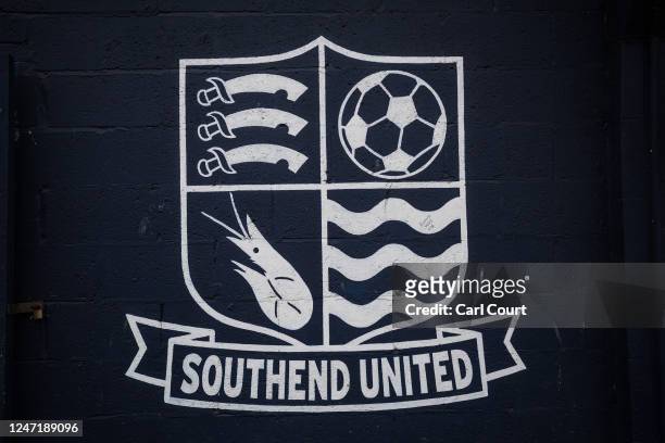 Slogans and club branding is displayed on buildings next to Roots Hall football stadium, home of Southend United Football Club, on February 16, 2023...