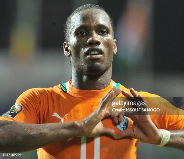 Ivory Coast's national football team captain Didier Drogba greets supporters after their victory against Mali at the stade de l'amitie in Libreville...