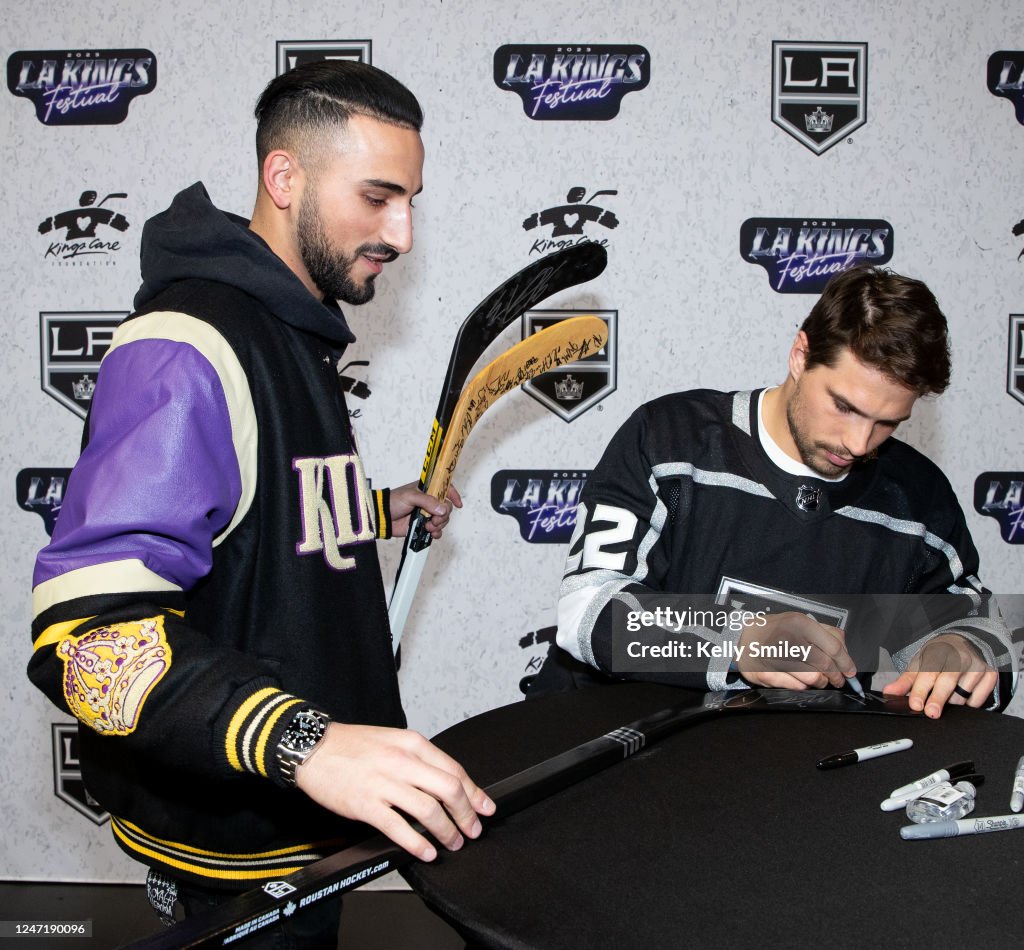 Kevin Fiala of the Los Angeles Kings signs autographs during the LA Kevin Fiala of the Los Angeles Kings signs autographs during the LA