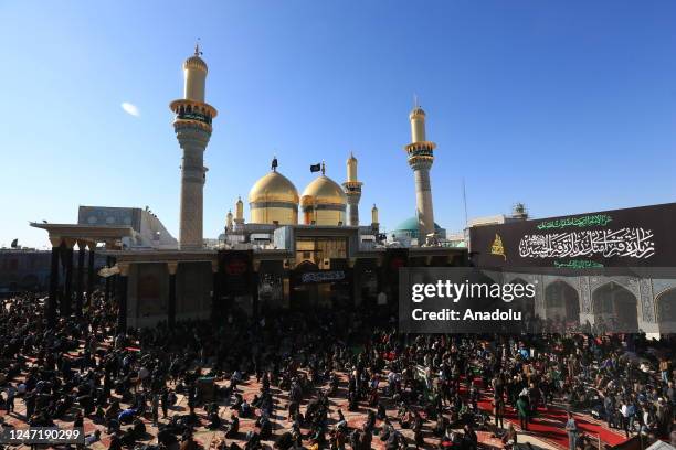 Iraqis attend the commemoration of Musa al-Kadhim on the anniversary of his death at Shrine of Imam Musa al-Kadhim in Baghdad, Iraq on February 16,...