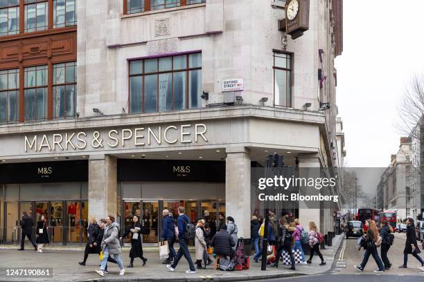 Shoppers outside the Marks & Spencer Group Plc flagship store on Oxford Street in central London, UK, on Thursday, Feb. 16, 2023. The UKs inflation...