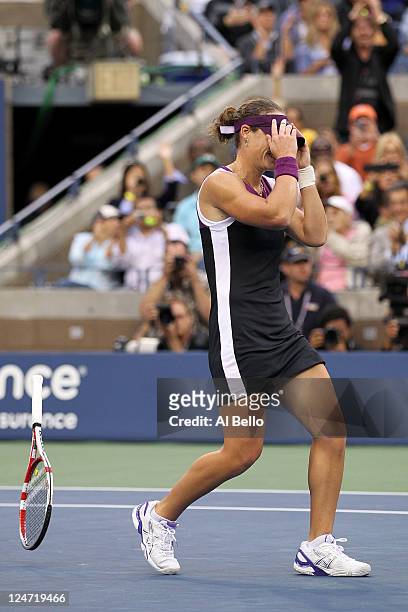 Samantha Stosur of Australia reacts after defeating Serena Williams of the United States to win the Women's Singles Final on Day Fourteen of the 2011...