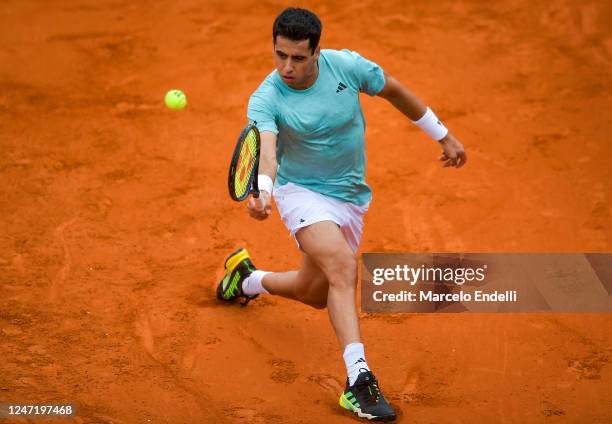 Jaume Munar of Spain plays a backhand in the round of sixteen singles match against Francisco Cerundolo of Argentina during day three of the ATP 250...