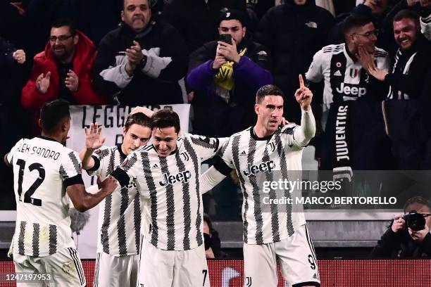 Juventus' Serbian forward Dusan Vlahovic celebrates after opening the scoring during the UEFA Europa League round of 32, first leg football match...