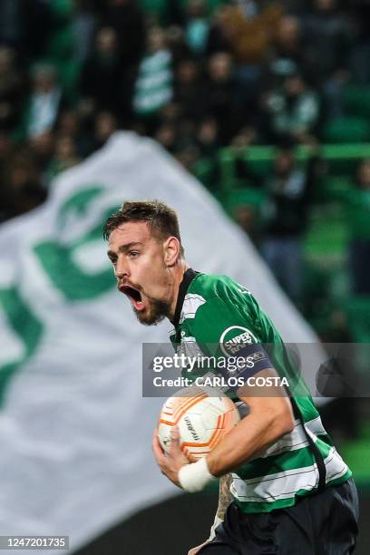 Sporting Lisbon's Uruguayan defender Sebastian Coates celebrates after scoring his team's first goal during the UEFA Europa League round of 32...