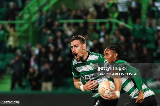 Sporting Lisbon's Uruguayan defender Sebastian Coates celebrates after scoring his team's first goal during the UEFA Europa League round of 32...