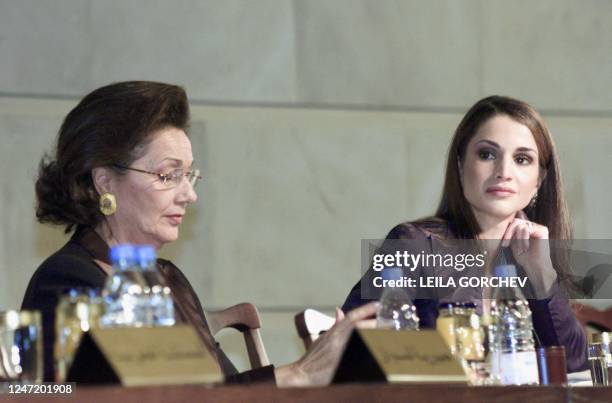 Queen Rania of Jordan and Egypt's First Lady Suzanne Mubarak attend the opening session of the second Arab Women's Summit 03 November 2002 in Amman....