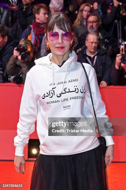 Meret Becker attends the "She Came to Me" premiere and opening ceremony red carpet during the 73rd Berlinale International Film Festival Berlin at...