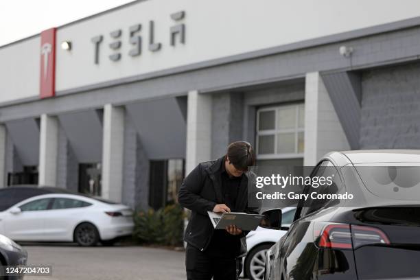 Tesla Dealership along 811 S San Fernando Blvd, Thursday, Feb. 16, 2023 in Burbank, CA. Tesla, Inc. Is recalling 362,758 vehicles in the U.S. Because...