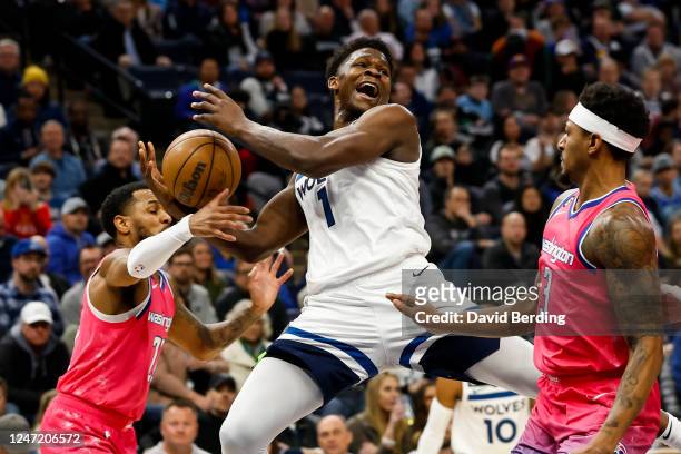 Anthony Edwards of the Minnesota Timberwolves reacts to getting fouled by Bradley Beal of the Washington Wizards in the first quarter of the game at...
