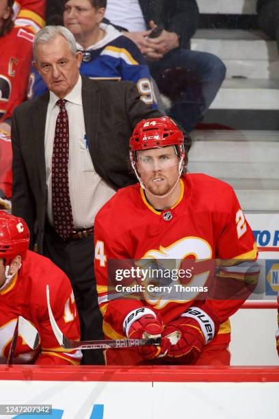 Brett Ritchie of the Calgary Flames looks on from the bench against the Detroit Red Wings at Scotiabank Saddledome on February 16, 2023 in Calgary,...