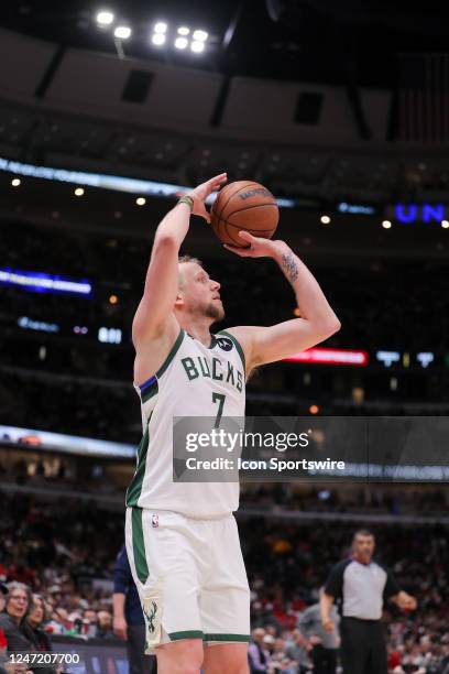 Milwaukee Bucks Guard Joe Ingles shoots a 3-point basket during a NBA game between the Milwaukee Bucks and the Chicago Bulls on February 16, 2023 at...