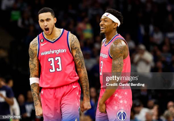 Bradley Beal of the Washington Wizards celebrates his three-point basket with teammate Kyle Kuzma in the fourth quarter of the game against the...