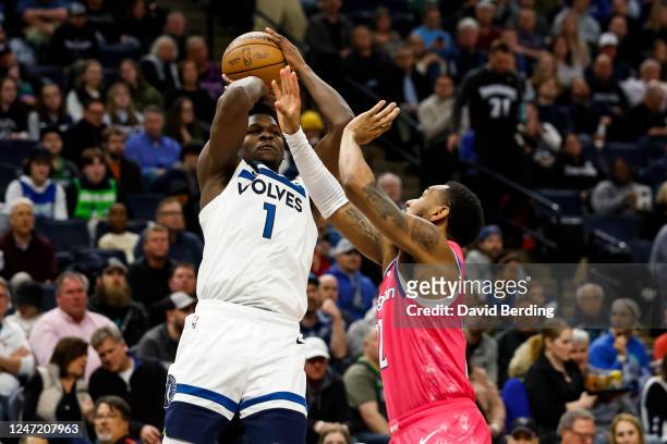 Anthony Edwards of the Minnesota Timberwolves shoots the ball while Monte Morris of the Washington Wizards defends in the second quarter of the game...