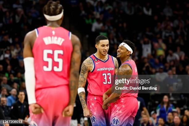 Delon Wright and Kyle Kuzma of the Washington Wizards celebrate a three-point basket by teammate Bradley Beal against the Minnesota Timberwolves in...