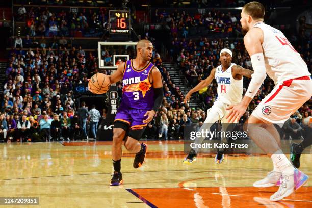 Chris Paul of the Phoenix Suns drives to the basket during the game against the LA Clippers on February 16, 2023 at Footprint Center in Phoenix,...