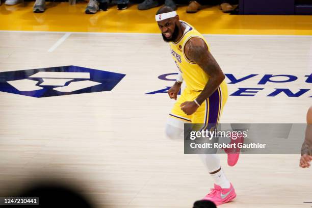 Los Angeles Lakers forward LeBron James reacts after a three-point shot during the third quarter against the Oklahoma City Thunder at Crypto.com...