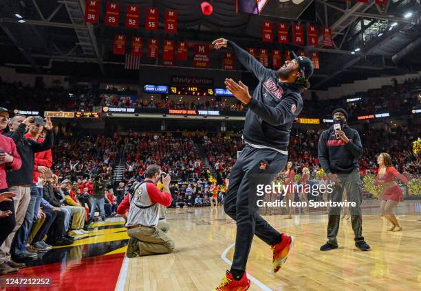 Former Maryland Terrapins player, Greivis Vásquez throws a T-shirt to fans during the Purdue Boilermakers game versus the Maryland Terrapins on...