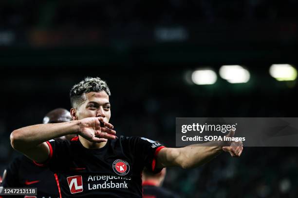 Emam Ashour of FC Midtjylland celebrates after scoring a goal during the Knockout Round Play-Off Leg One - UEFA Europa League match between Sporting...
