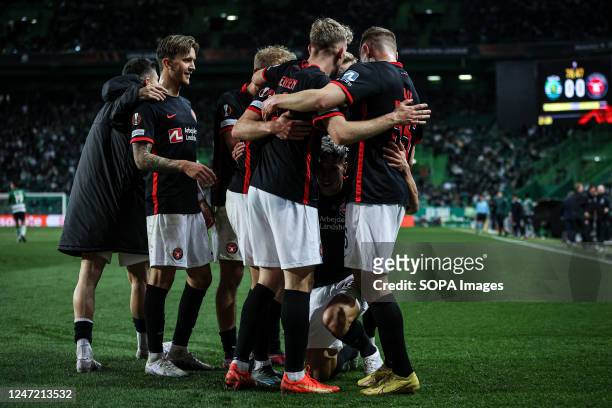 Emam Ashour of FC Midtjylland celebrates a goal with his teammates during the Knockout Round Play-Off Leg One - UEFA Europa League match between...
