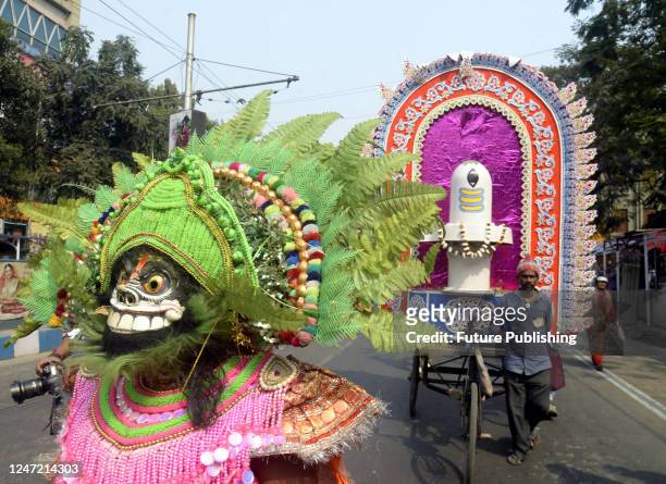 Traditional Chau artists take part during a procession as part of the Maha Shiv Ratri celebration, a popular Hindu festival celebrated every year in...