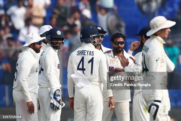 Ravindra Jadeja of India celebrates the wicket of Pat Cummins of Australia during day one of the Second Test match in the series between India and...