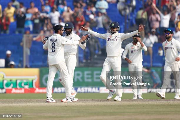 Ravindra Jadeja of India celebrates the wicket of Pat Cummins of Australia during day one of the Second Test match in the series between India and...