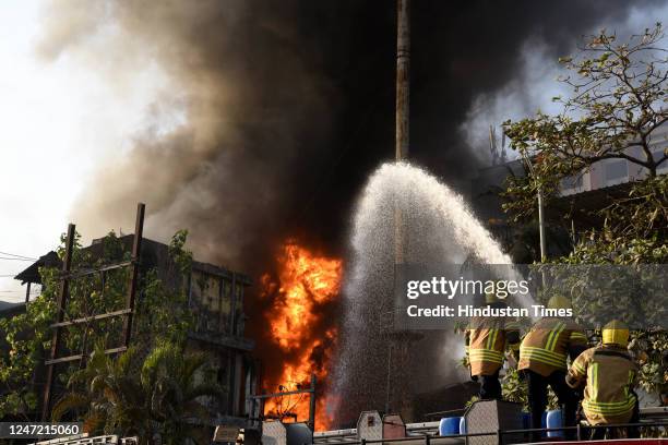 Firefighters trying to extinguish a major fire that broke out at a garment factory at Turbhe MIDC, on February 16, 2023 in Navi Mumbai, India.