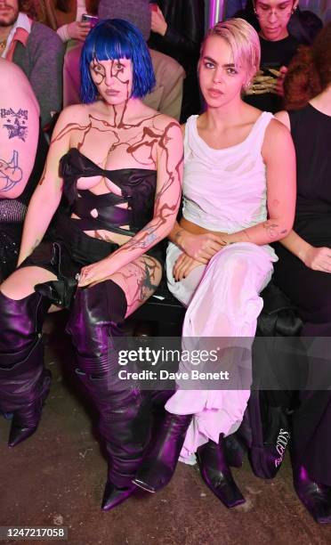 Ashnikko and Bee Beardsworth attend the Fashion East front row during London Fashion Week February 2023 at The Truman Brewery on February 17, 2023 in...