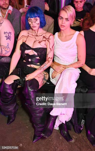 Ashnikko and Bee Beardsworth attend the Fashion East front row during London Fashion Week February 2023 at The Truman Brewery on February 17, 2023 in...