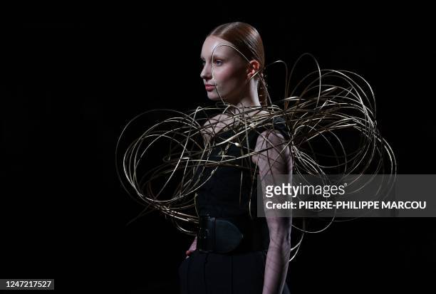 Model displays an outfit by Spanish designer Isabel Sanchis during the Mercedes Benz Fashion Week in Madrid on February 17, 2023.