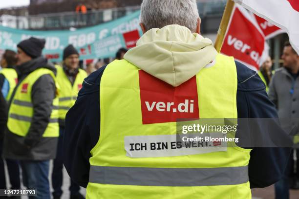 Ground services employees from the Verdi union protest during strike action at Munich International Airport in Munich, Germany, on Friday, Feb. 17,...