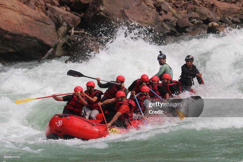 India Rafting People raft down the Ganges River near Rishikesh on February 17, 2023 ...