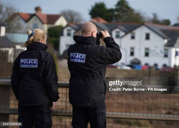 Police officers on the Shard Bridge on the River Wyre in Hambleton, Lancashire, as police continue their search for missing woman Nicola Bulley who...