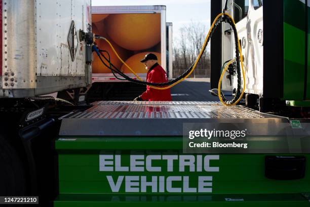 Driver prepares a Daimler Freightliner eCascadia all-electric semitruck ahead of a Meijer delivery in Lansing, Michigan, US, on Tuesday, Feb. 14,...