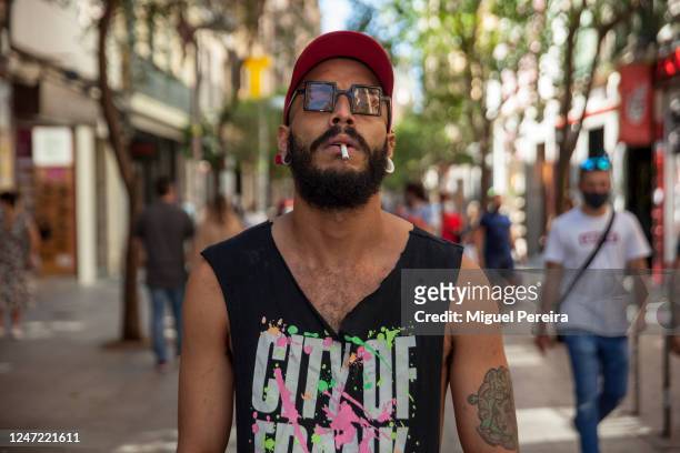 Rhaul wears Urban Home T-shirt, New York Yankees cap, and Christian Dior glasses during Phase 1 of reopening from the COVID-19 lockdown on June 6 on...