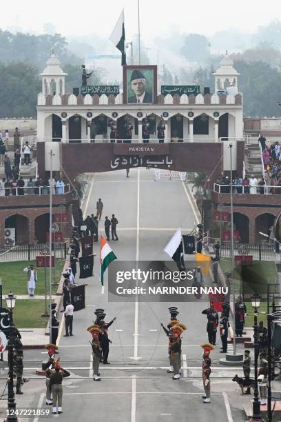 Indian Border Security Force soldiers and Pakistani Rangers take part in the daily beating Retreat ceremony at the India Pakistan Wagah border post,...