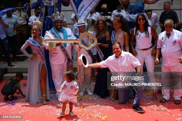 King Momo Djeferson Mendes da Silva receives the keys to the city of Rio from Rios Mayor Eduardo Paes during the official carnival opening ceremony...