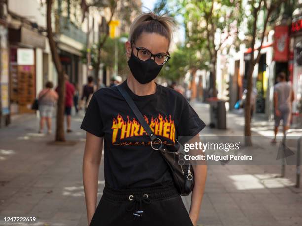 Carolina wears Transit T-shirt, Creative Freedom shorts, Zadig & Voltaire glasses, and Adidas face mask during Phase 1 of reopening from the COVID-19...
