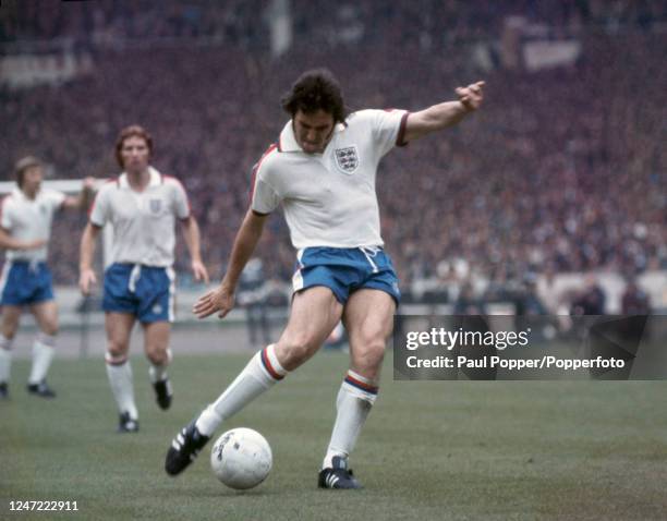 Gerry Francis of England scores the first goal during the British Home Championship match between England and Scotland at Wembley Stadium on May 24,...