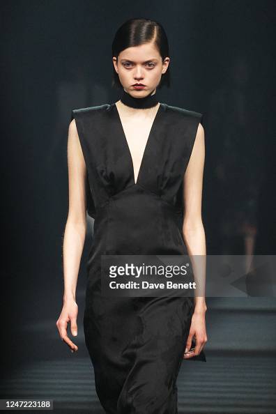 A model walks the runway at the Huishan Zhang show during London ...